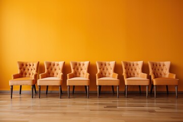Orange chairs standing in an empty room