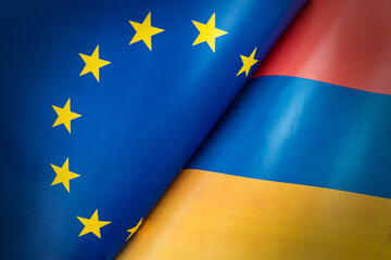 Flags of European Union, armenia. The concept of international relations between countries. The concept of an alliance or a confrontation between two state governments. Friendship of peoples. - obrazy, fototapety, plakaty