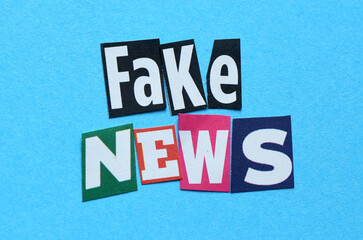 FAKE NEWS words made of letters cut out from newspapers.