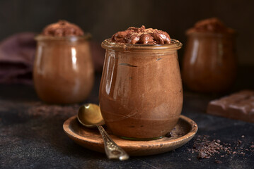 Delicious chocolate mousse in a vintage jars.