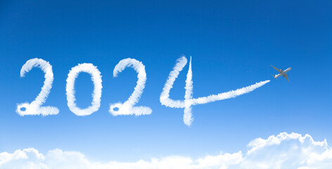 Naklejka na ściany i meble happy New year 2022 concept. cloud drawing by airplane in sky
