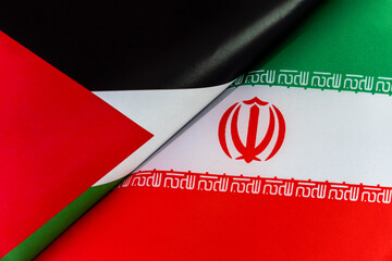 Background of the flags of the iran, palestine. The concept of interaction or counteraction between...