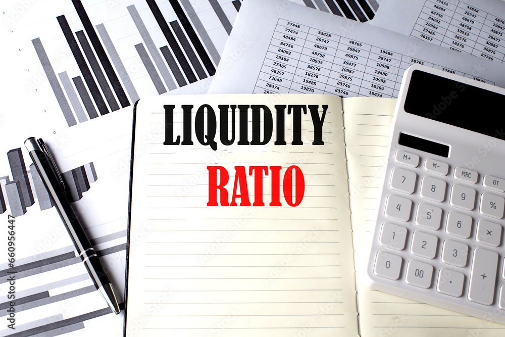 Poster liquidity ratio text written on a notebook on chart and diagram