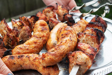 Meat and sausage on a grill closeup