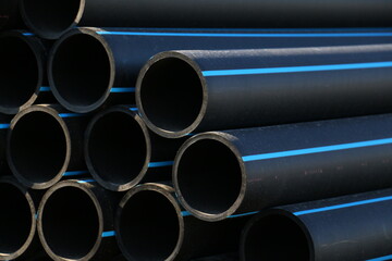 PE pipe plant, Industrial PE pipeline for gas and water. HDPE pipe, Polyethylene PE100 pipe. Polyethylene pipe plant - obrazy, fototapety, plakaty