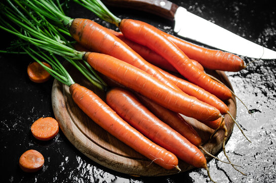 Carrots on a cutting board.