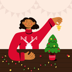 Christmas tree decoration woman. a woman in reindeer sweater decorates a Christmas tree sitting at a table. Vector flat illustration