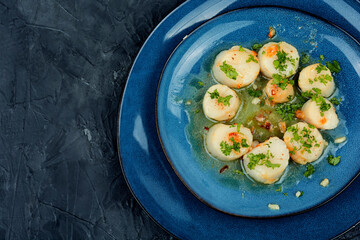 Scallops seared in garlic, space for text.