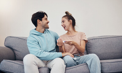 Pregnancy test, happy and couple in home living room, reading good news or check results. Kit, excited man and pregnant woman or mother smile on sofa for success, future maternity or ivf fertility