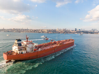 Aerial view of freight ship with cargo containers.