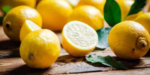 Fresh lemons. On wooden table.