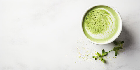 matcha latte top view on a white table  - obrazy, fototapety, plakaty