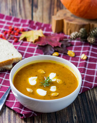 pumpkin soup. on a wooden background. gourmet. lunch .season