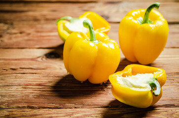 Fresh sweet pepper. On wooden table. © Artem Shadrin