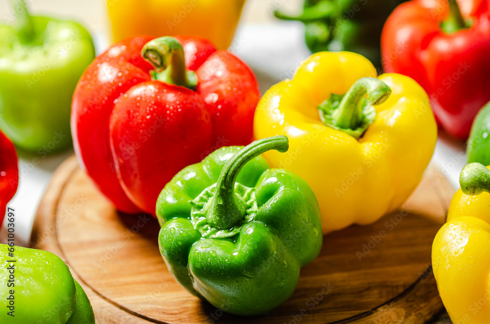 Poster Fresh sweet pepper. On white table.