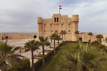Citadel of Qaitbay building ancient fort at Mediterranean sea coast, in Alexandria, Egypt