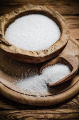 Salt background . On wooden table.