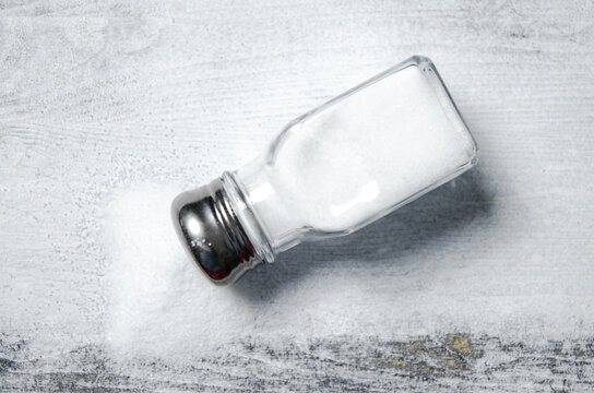 Salt background . On white table.