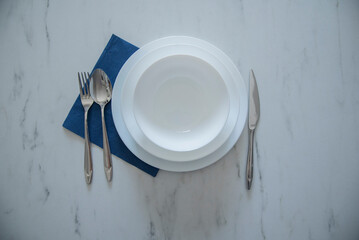 An empty white plates, overhead flat lay shot