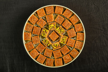 A box of assorted Arabic sweets with pistachios-2.jpg