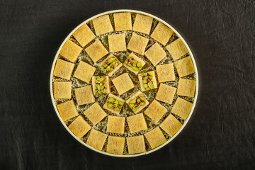 A box of assorted Arabic sweets with pistachios-3.jpg