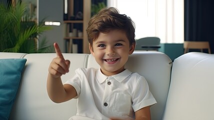 a cheerful child sitting on a modern living room sofa, waving with enthusiasm and connecting with friends and family through a webcam.