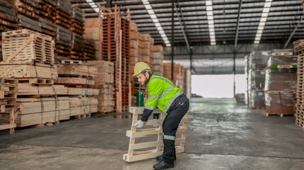 Fototapeta premium Determined woodworker measures, shapes, and balances wood with precision using hand and power tools