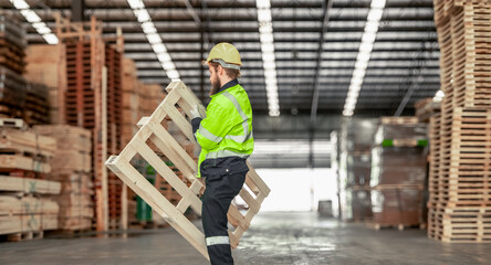 Fototapeta premium Determined woodworker measures, shapes, and balances wood with precision using hand and power tools