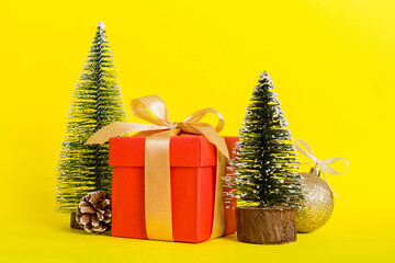 Christmas composition. craft Gift box, small tree, branches and craft DIY decorations on white background. New year concept. Christmas home decoration Flat lay, top view, copy space