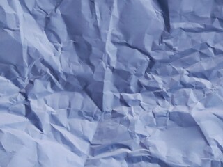 Abstract white crumpled paper texture background
