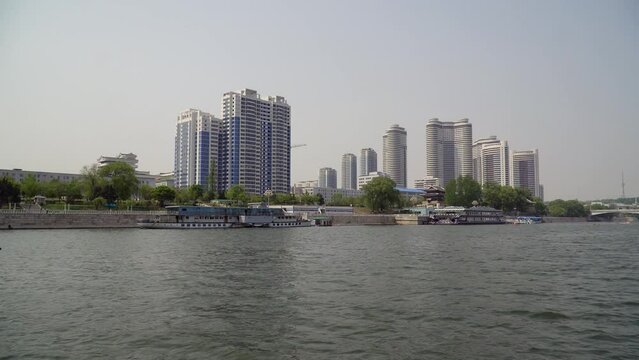 Pyongyang, North Korea, view of the city buildings from the Taedong River