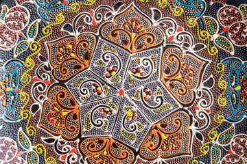 A beautiful plate with many beautiful designs and patterns