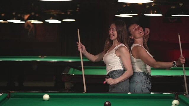 two women are dancing. slow motion video. two women. High quality video in FullHD format.
