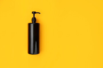 Black plastic spray bottle for aerosol sanitizer with pump handle. Sprayer Jet, mist, foam, stream - obrazy, fototapety, plakaty