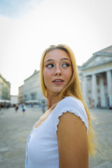 Portrait of a young attractive girl looking to the side, attractive expressive woman