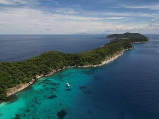 Beautiful boat near paradise island