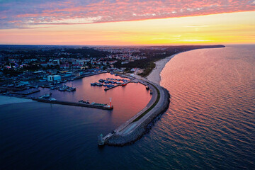 Harbor with vessel at sunset, aerial view. Port at Baltic sea in Wladyslawowo, Poland - obrazy, fototapety, plakaty