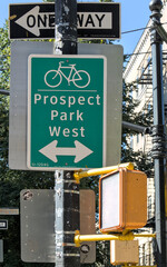 prospect park west bike lane sign close up (two way cycling path for biking) one way, traffic light...