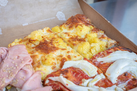 Pizza Slice At Famous Pizzeria