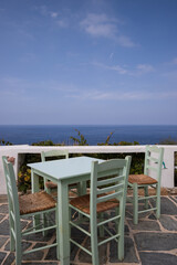 Table with idyllic sea view at a cozy greek tavern.