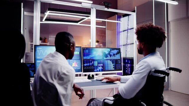 African Analyst In Wheelchair - Powered by Adobe