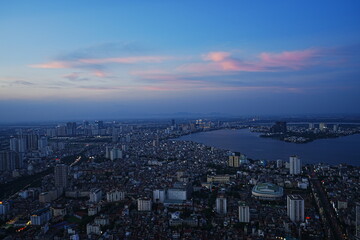 Naklejka na ściany i meble Aerial View of Hanoi City from Top of Hanoi, Rooftop Bar, at Lotte Hotel Hanoi in Vietnam - ベトナム ハノイ 全景