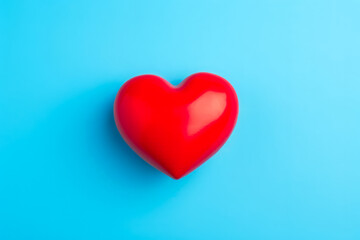 Health Insurance Concept with Red Heart, Text Space on Blue Background, Flat Lay