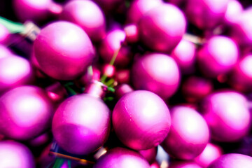 a setup for decoration purposes like xmas with shiny pink christmas baubles