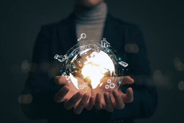 The globe icon is on a businessman's hand and there are icons related to finance, investment. Concepts of searching for information and finding business ideas. Future technology. Big Data.