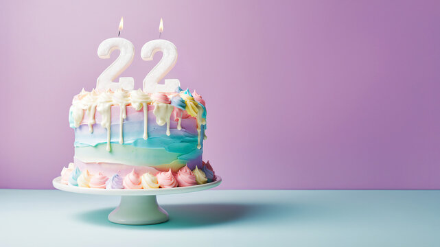 22nd year birthday cake on isolated colorful pastel background