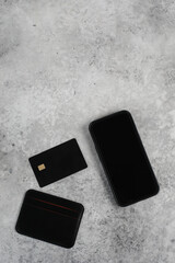  blank screen mobile phone and credit card isolated on gray background, Premium banking concept. Logo design presentation. banner mock up, template, top view, flate lay, Business and technology