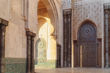 the Famous Hassan II mosque exterior, Hassan II mosque sqaure at sunset, Casablanca, Morocco - obrazy, fototapety, plakaty