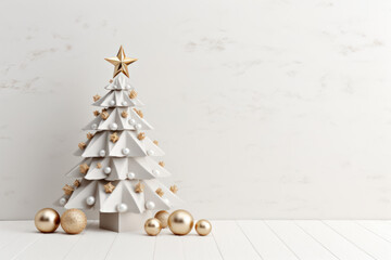 Christmas tree with golden baubles on white background. Copy space. Banner. Xmas greeting card. 