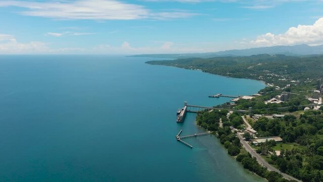 Cement plant and power station industrial building in coastal area. Lugait, Misamis Oriental. Mindanao, Philippines.